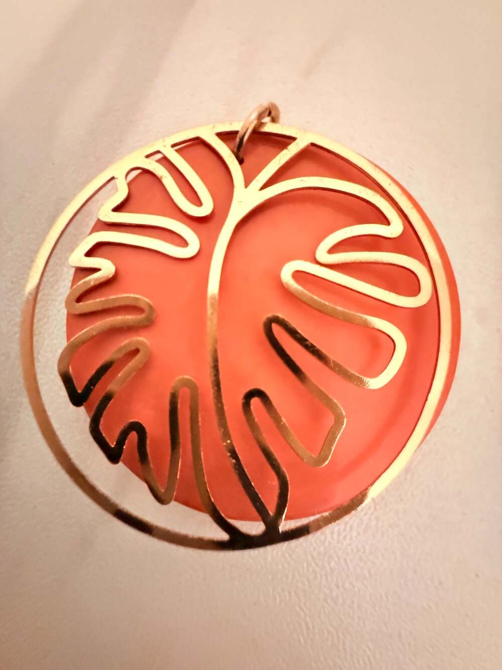 Gold Tone Monstera Leaf Pendant Orange Acrylic Backing